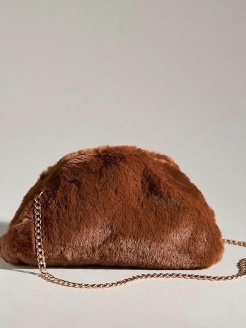 Anthropologie the Frankie mini faux fur clutch